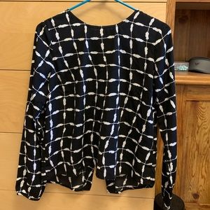 Zebra print fly back blouse